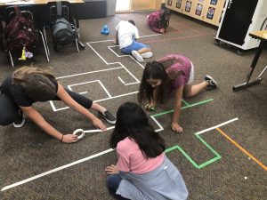 students creating dash maze