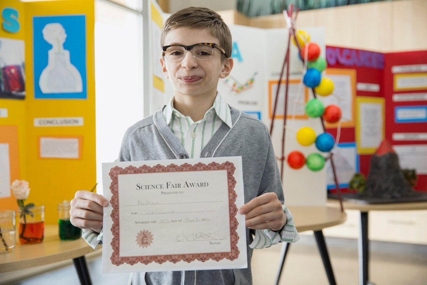 Kid with science fair award